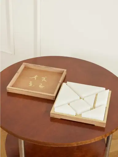 Brunello Cucinelli Wood And Onyx Tangram Game | Thumbnail 1 Brunello Cucinelli Wood And Onyx Tangram Game | Thumbnail 1