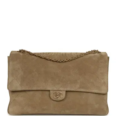 Chanel Chanel Maxi "Souplissimo" Large Flap Bag Dark Beige Suede Gold Hardware | Thumbnail 1 Chanel Chanel Maxi "Souplissimo" Large Flap Bag Dark Beige Suede Gold Hardware | Thumbnail 1