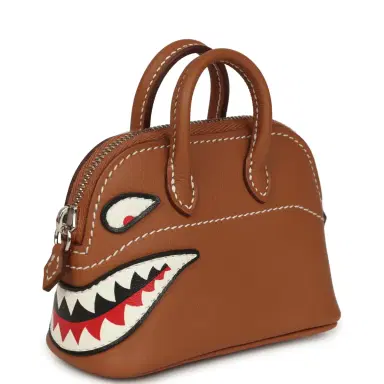 HERMÈS Hermes Mini Bolide Shark Bag Charm Gold and White Swift Palladium Hardware | Thumbnail 5 HERMÈS Hermes Mini Bolide Shark Bag Charm Gold and White Swift Palladium Hardware | Thumbnail 5