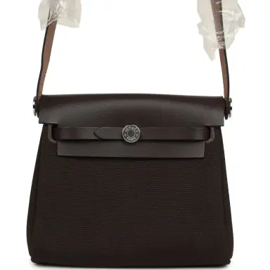HERMÈS Hermes Herbag Zip 20 Mini Ebene Toile Militaire Canvas and Vache Hunter Palladium Hardware | Thumbnail 1 HERMÈS Hermes Herbag Zip 20 Mini Ebene Toile Militaire Canvas and Vache Hunter Palladium Hardware | Thumbnail 1
