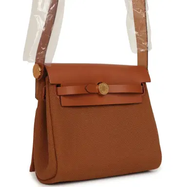 HERMÈS Hermes Herbag Zip 20 Mini Fauve Toile H Canvas and Vache Hunter Gold Hardware | Thumbnail 2 HERMÈS Hermes Herbag Zip 20 Mini Fauve Toile H Canvas and Vache Hunter Gold Hardware | Thumbnail 2