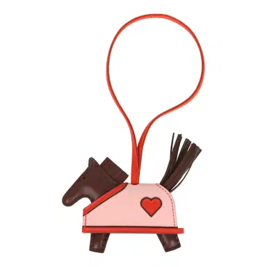 HERMÈS Hermes Rodeo Robeo Coeur Charm PM Terre, Capucine & Rose Sakura Milo Lambskin | Thumbnail 1 HERMÈS Hermes Rodeo Robeo Coeur Charm PM Terre, Capucine & Rose Sakura Milo Lambskin | Thumbnail 1