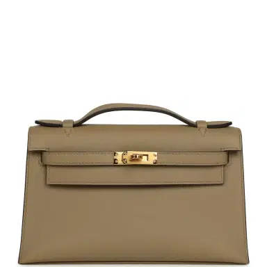 HERMÈS Hermes Kelly Pochette Beige Marfa Swift Gold Hardware | Thumbnail 1 HERMÈS Hermes Kelly Pochette Beige Marfa Swift Gold Hardware | Thumbnail 1