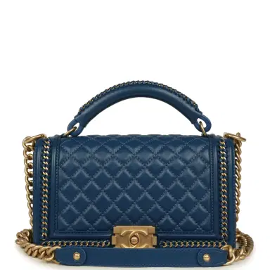 Chanel Pre-owned Chanel Medium Top Handle Braided Boy Bag Blue Lambskin Antique Gold Hardware | Thumbnail 1 Chanel Pre-owned Chanel Medium Top Handle Braided Boy Bag Blue Lambskin Antique Gold Hardware | Thumbnail 1