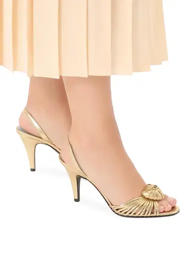 Valentino Garavani Women's Coeur Royal 85MM Sandals in Laminated Nappa Leather - Antique Brass | Thumbnail 7 Valentino Garavani Women's Coeur Royal 85MM Sandals in Laminated Nappa Leather - Antique Brass | Thumbnail 7