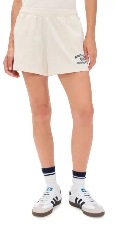 Sporty & Rich Varsity Crest Disco Shorts Ecru | Thumbnail 1 Sporty & Rich Varsity Crest Disco Shorts Ecru | Thumbnail 1