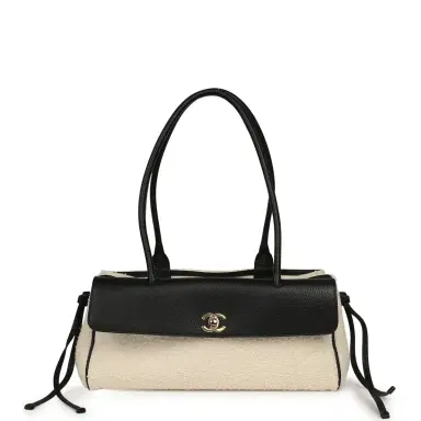 Chanel Chanel Small "Urban Essential" East West Shopping Tote Black Calfskin and White Tweed Boucle Gold Hardware | Thumbnail 1 Chanel Chanel Small "Urban Essential" East West Shopping Tote Black Calfskin and White Tweed Boucle Gold Hardware | Thumbnail 1