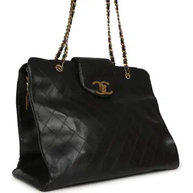 Chanel Vintage Chanel XL Supermodel Tote Bag Black Calfskin Gold Hardware | Thumbnail 2 Chanel Vintage Chanel XL Supermodel Tote Bag Black Calfskin Gold Hardware | Thumbnail 2