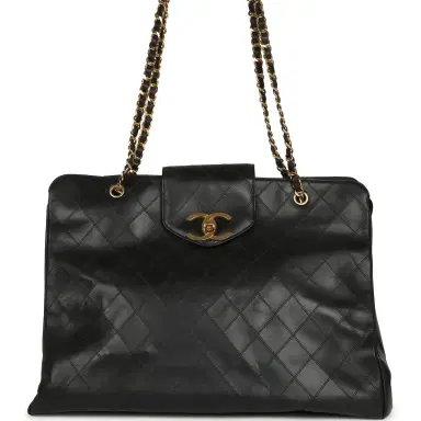 Chanel Vintage Chanel XL Supermodel Tote Bag Black Calfskin Gold Hardware | Thumbnail 1 Chanel Vintage Chanel XL Supermodel Tote Bag Black Calfskin Gold Hardware | Thumbnail 1