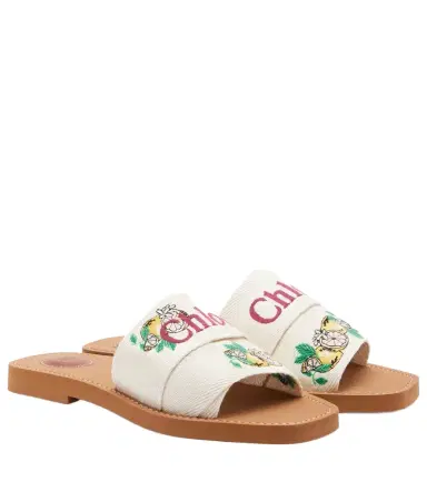 Chloé Chloé Woody embroidered linen slides | Thumbnail 1 Chloé Chloé Woody embroidered linen slides | Thumbnail 1