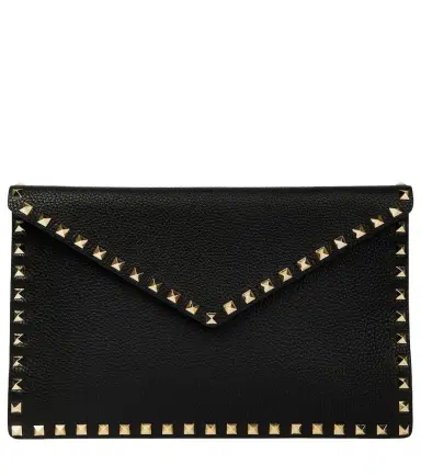 Valentino Garavani Rockstud leather clutch | Thumbnail 1 Valentino Garavani Rockstud leather clutch | Thumbnail 1