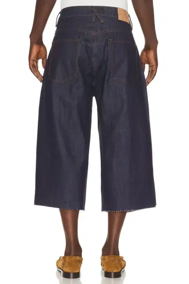 KidSuper Studded Face Plated Long Shorts | Thumbnail 2 KidSuper Studded Face Plated Long Shorts | Thumbnail 2