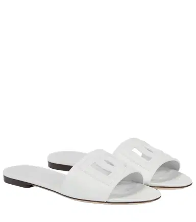 Dolce & Gabbana Logo cutout leather slides | Thumbnail 1 Dolce & Gabbana Logo cutout leather slides | Thumbnail 1