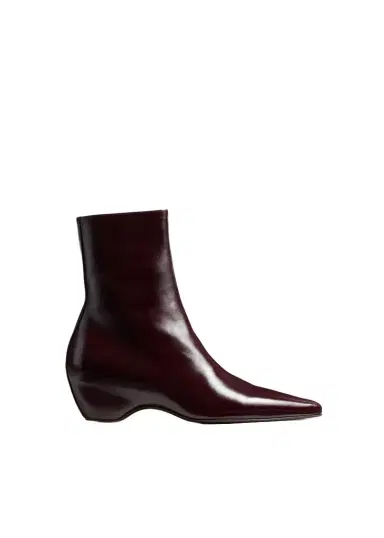 Khaite Sybil Ankle Boot In Bordeaux Glazed Leather | Thumbnail 1 Khaite Sybil Ankle Boot In Bordeaux Glazed Leather | Thumbnail 1