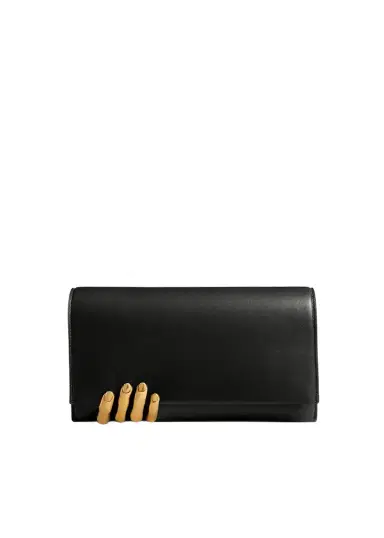 Khaite Sculpted Hand Clutch In Black Leather | Thumbnail 1 Khaite Sculpted Hand Clutch In Black Leather | Thumbnail 1