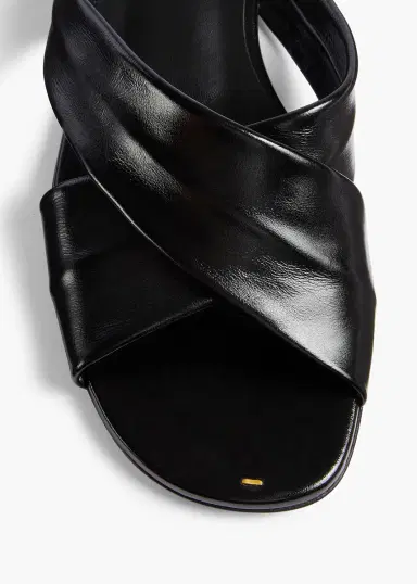Khaite Liria Flat Sandal In Black Glazed Leather | Thumbnail 3 Khaite Liria Flat Sandal In Black Glazed Leather | Thumbnail 3