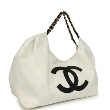 Chanel Chanel Maxi Coco Beach Cambon Hobo Bag White Denim and Black Calfskin Brushed Gold Hardware | Thumbnail 2 Chanel Chanel Maxi Coco Beach Cambon Hobo Bag White Denim and Black Calfskin Brushed Gold Hardware | Thumbnail 2