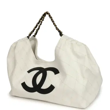 Chanel Chanel Maxi Coco Beach Cambon Hobo Bag White Denim and Black Calfskin Brushed Gold Hardware | Thumbnail 5 Chanel Chanel Maxi Coco Beach Cambon Hobo Bag White Denim and Black Calfskin Brushed Gold Hardware | Thumbnail 5