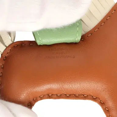 HERMÈS Hermes Rodeo Bag Charm PM Gold, Craie, Vert Criquet Milo Lambskin | Thumbnail 3 HERMÈS Hermes Rodeo Bag Charm PM Gold, Craie, Vert Criquet Milo Lambskin | Thumbnail 3