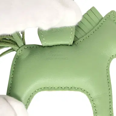 HERMÈS Hermes Rodeo Bag Charm PM Vert Criquet Milo Lambskin | Thumbnail 3 HERMÈS Hermes Rodeo Bag Charm PM Vert Criquet Milo Lambskin | Thumbnail 3