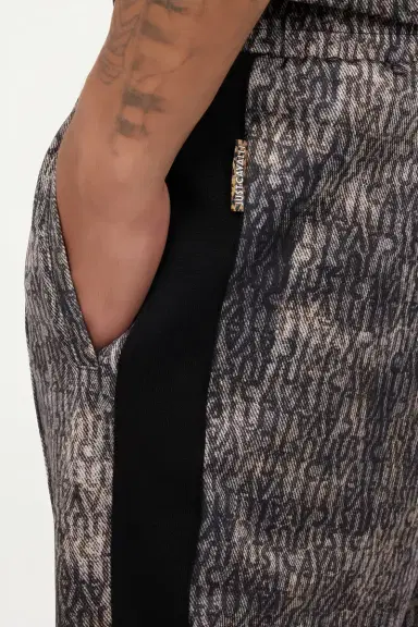 Roberto Cavalli Faded Effect Trousers With All-Over Lettering | Thumbnail 5 Roberto Cavalli Faded Effect Trousers With All-Over Lettering | Thumbnail 5