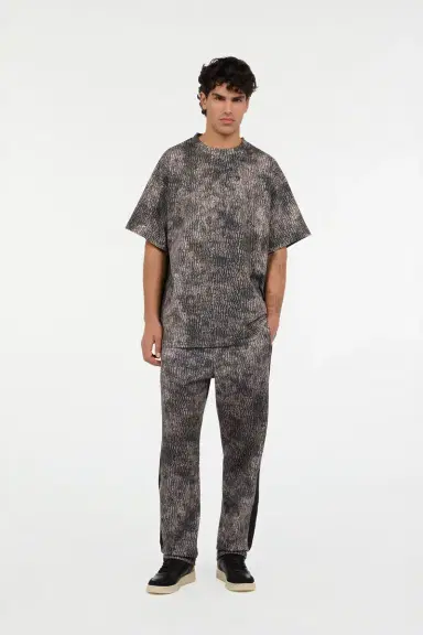 Roberto Cavalli Faded Effect Trousers With All-Over Lettering | Thumbnail 7 Roberto Cavalli Faded Effect Trousers With All-Over Lettering | Thumbnail 7