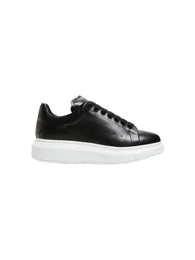 Alexander McQueen Women's Oversized Embossed Logo Leather Sneakers - Black - Size 12 | Thumbnail 1 Alexander McQueen Women's Oversized Embossed Logo Leather Sneakers - Black - Size 12 | Thumbnail 1