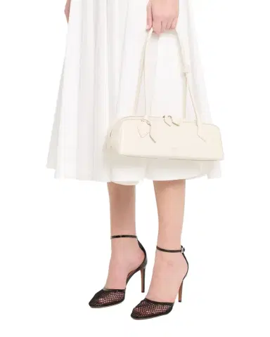 Alaïa Le Teckel Medium Shoulder Bag in Goatskin | Thumbnail 1 Alaïa Le Teckel Medium Shoulder Bag in Goatskin | Thumbnail 1