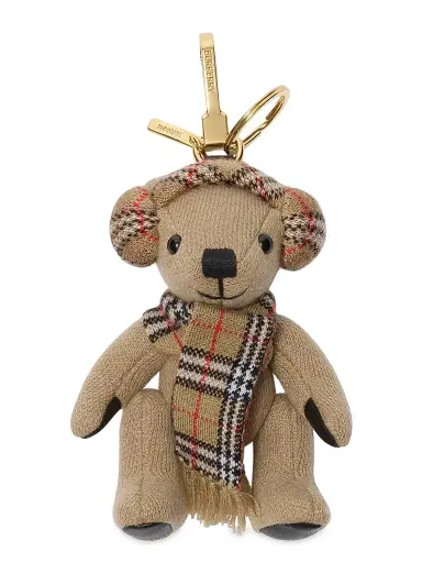 Burberry Women's Thomas Earmuff Bear Keychain - Sand | Thumbnail 1 Burberry Women's Thomas Earmuff Bear Keychain - Sand | Thumbnail 1