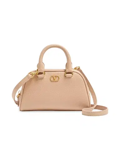 Valentino Garavani Women's VLogo Signature Mini Bowling Bag in Grainy Calfskin - Rose Sand | Thumbnail 1 Valentino Garavani Women's VLogo Signature Mini Bowling Bag in Grainy Calfskin - Rose Sand | Thumbnail 1