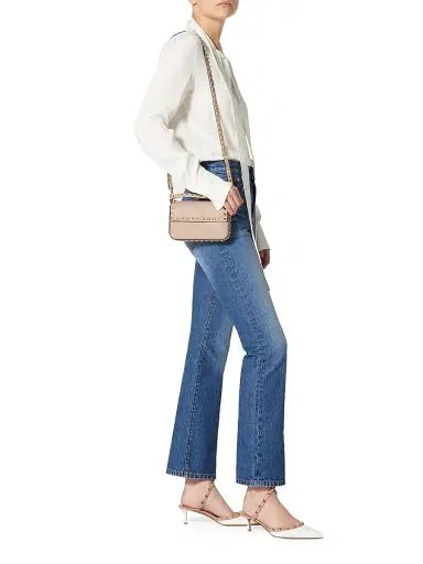 Valentino Garavani Women's Rockstud Grainy Calfskin Pouch | Thumbnail 1 Valentino Garavani Women's Rockstud Grainy Calfskin Pouch | Thumbnail 1