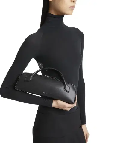 ALAÏA Le Teckel Top-Handle Bag in Grained Leather | Thumbnail 1 ALAÏA Le Teckel Top-Handle Bag in Grained Leather | Thumbnail 1