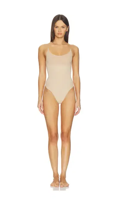 Skims Sheer Seamless Thong Bodysuit | Thumbnail 1 Skims Sheer Seamless Thong Bodysuit | Thumbnail 1