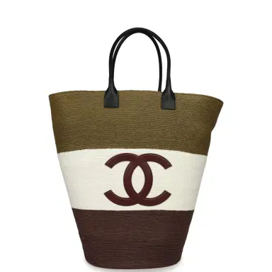 Chanel Chanel Coco Beach Maxi Shopping Bag Khaki, White, Brown Raffia and Black Calfskin | Thumbnail 1 Chanel Chanel Coco Beach Maxi Shopping Bag Khaki, White, Brown Raffia and Black Calfskin | Thumbnail 1