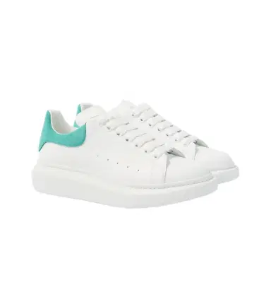 Alexander McQueen Oversized leather sneakers | Thumbnail 1 Alexander McQueen Oversized leather sneakers | Thumbnail 1