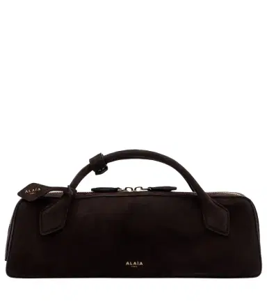 Alaia Alaïa Le Teckel Small suede clutch | Thumbnail 1 Alaia Alaïa Le Teckel Small suede clutch | Thumbnail 1