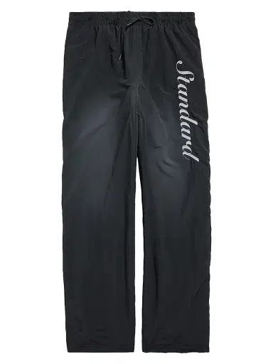 Balenciaga Men's Standard Script Tracksuit Pants in Technical Fabric - Black | Thumbnail 1 Balenciaga Men's Standard Script Tracksuit Pants in Technical Fabric - Black | Thumbnail 1