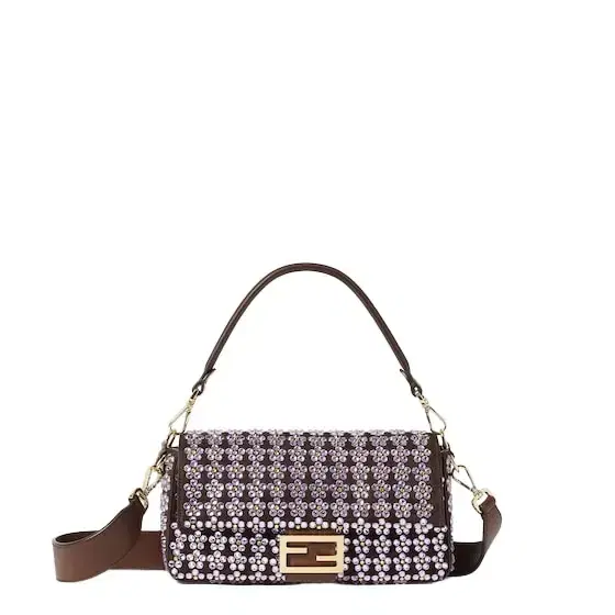 Iconic medium Baguette® bag, created in 1997, which went Iconic medium Baguette® bag, created in 1997, which went