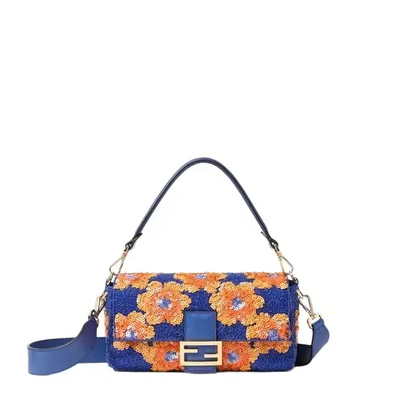Iconic medium Baguette® bag, created in 1997, which went Iconic medium Baguette® bag, created in 1997, which went