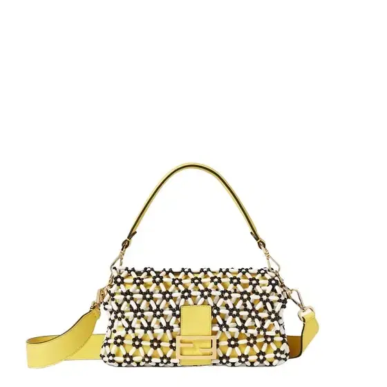 Iconic medium Baguette® bag, created in 1997, which went Iconic medium Baguette® bag, created in 1997, which went