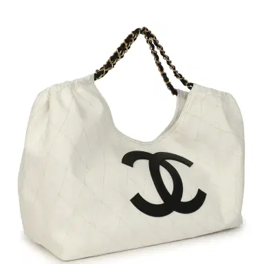 Chanel Chanel Maxi Coco Beach Cambon Hobo Bag White Denim and Black Calfskin Brushed Gold Hardware | Thumbnail 2 Chanel Chanel Maxi Coco Beach Cambon Hobo Bag White Denim and Black Calfskin Brushed Gold Hardware | Thumbnail 2