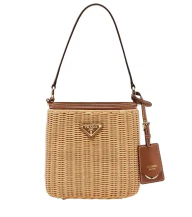 Prada Leather-trimmed wicker bucket bag | Thumbnail 1 Prada Leather-trimmed wicker bucket bag | Thumbnail 1