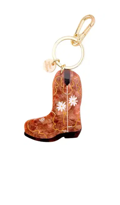 Solar Eclipse Hand-painted Daisy Cowboy Boot Bag Charm + Keychain | Thumbnail 1 Solar Eclipse Hand-painted Daisy Cowboy Boot Bag Charm + Keychain | Thumbnail 1