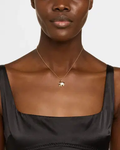 Chopard Happy Diamonds 18K Rose Gold Sapphire Elephant Pendant Necklace | Thumbnail 1 Chopard Happy Diamonds 18K Rose Gold Sapphire Elephant Pendant Necklace | Thumbnail 1