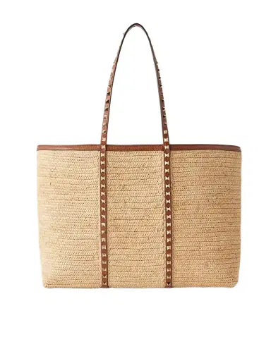 Valentino Garavani Rockstud Leather-trimmed Raffia Tote | Thumbnail 1 Valentino Garavani Rockstud Leather-trimmed Raffia Tote | Thumbnail 1