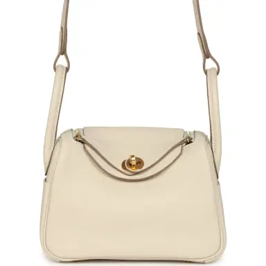 HERMÈS Hermes Mini Lindy II Craie Clemence Gold Hardware | Thumbnail 1 HERMÈS Hermes Mini Lindy II Craie Clemence Gold Hardware | Thumbnail 1