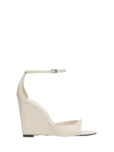 Schutz Women's Scarlett 100MM Patent Leather Wedge Sandals - Sugar White | Thumbnail 1 Schutz Women's Scarlett 100MM Patent Leather Wedge Sandals - Sugar White | Thumbnail 1