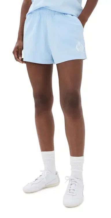 Sporty & Rich NY Crest Disco Shorts Ciel | Thumbnail 1 Sporty & Rich NY Crest Disco Shorts Ciel | Thumbnail 1