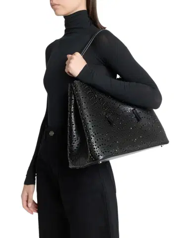 Alaïa Mina 37 Large Perforated Leather Tote Bag | Thumbnail 1 Alaïa Mina 37 Large Perforated Leather Tote Bag | Thumbnail 1