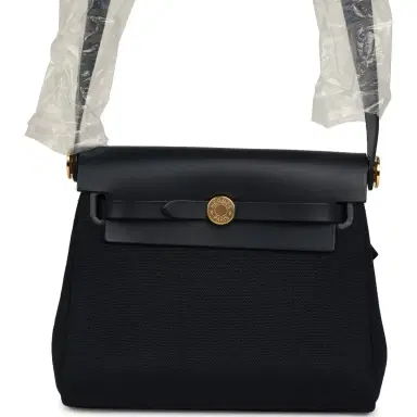 HERMÈS Hermes Herbag Zip 20 Mini Bleu Indigo Toile Militaire Canvas and Vache Hunter Gold Hardware | Thumbnail 1 HERMÈS Hermes Herbag Zip 20 Mini Bleu Indigo Toile Militaire Canvas and Vache Hunter Gold Hardware | Thumbnail 1